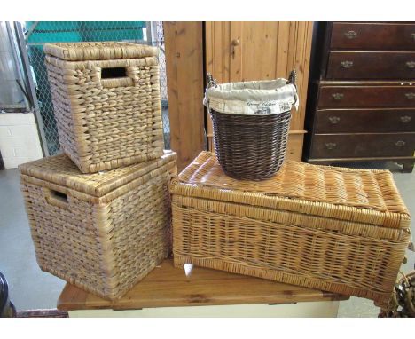 Collection of wicker items to include a two handled bin marked Grand Chateau, graduated set of two wicker boxes and a wicker 