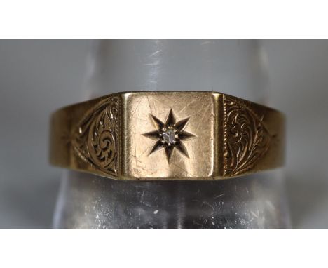 9ct gold signet ring set with a diamond.  Ring size approx W (cut to shank) approx weight 2.8 grams.(B.P. 21% + VAT) 