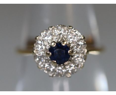 18ct gold sapphire and diamond cluster ring.  Ring size I&1/2.  Approx weight 2.4 grams.(B.P. 21% + VAT) 