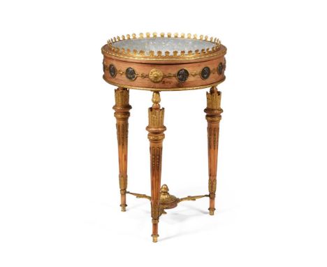 A FRENCH AMARANTH, BEECH, AND GILT METAL MOUNTED JARDINIERE TABLE IN LOUIS XVI STYLE, CIRCA 1900 The top with removable metal