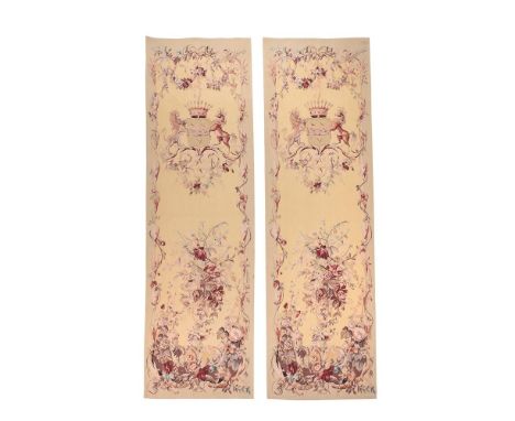 A PAIR OF AUBUSSON ARMORIAL TAPESTRY ENTRE FENETRES 19TH CENTURY Each with scrolling floral decoration on pale yellow ground,