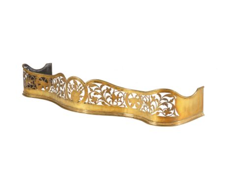A GEORGE III BRASS SERPENTINE FENDER CIRCA 1780 Of foliate pierced form approximately 24cm high, 142cm wide, 40cm deepConditi