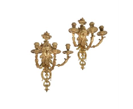 A PAIR OF FRENCH GILT METAL THREE-LIGHT WALL APPLIQUES  IN EARLY 18TH CENTURY STYLE, LATE 19TH CENTURY  Each with a female ma