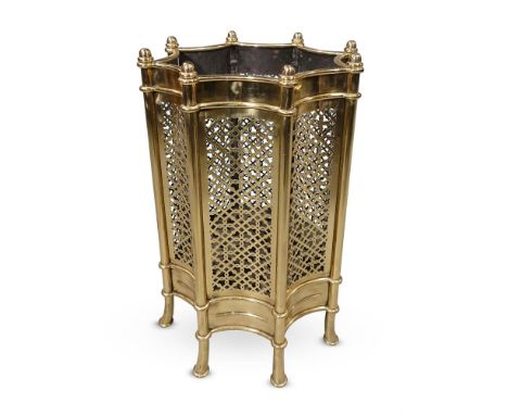 AN UNUSUAL BRASS COLLECTOR'S WALKING STICK STAND MID/LATE 20TH CENTURY Of swept octagonal form with pierced panel sides 73.5c