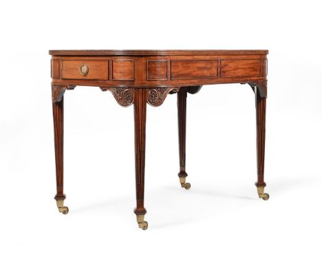 A MAHOGANY WRITING OR LIBRARY TABLEIN REGENCY STYLE, CIRCA 1880 With tooled leather inset top, frieze drawers to each end 76.