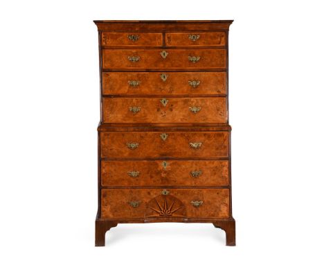 A GEORGE II WALNUT SECRETAIRE CHEST ON CHESTCIRCA 1740The fall drawer opening to an arrangement of drawers and pigeon holes, 