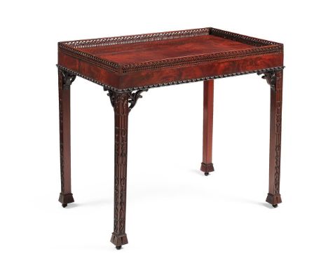 A MAHOGANY SILVER TABLE IN GEORGE III STYLE, IN THE MANNER OF THOMAS CHIPPENDALE, LATE 19TH CENTURYThe pierced gallery above 