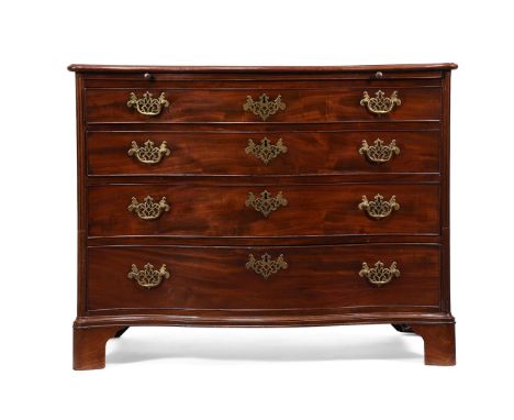 A GEORGE III MAHOGANY SERPENTINE CHEST OF DRAWERSCIRCA 1770With a slide, the drawers flanked by stop-fluted columns84cm high,