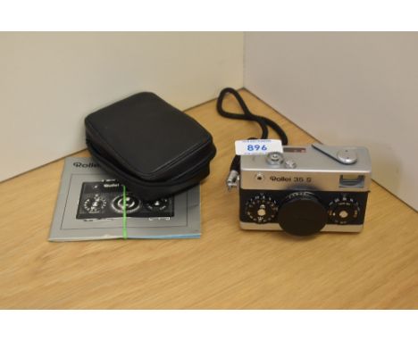 A Rollei 35S camera with booklet