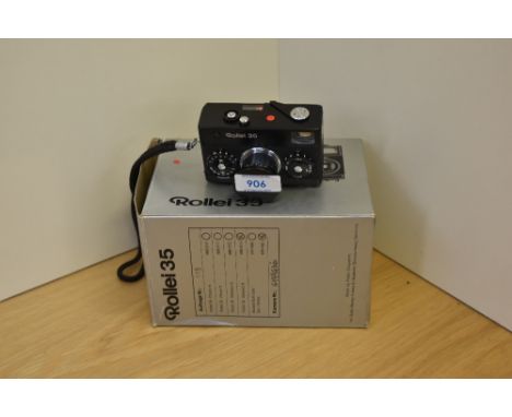 A boxed Rollei 35 camera (small dent to the body)