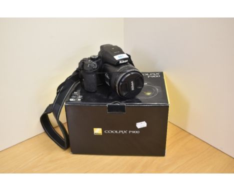 A Nikon Coolpix P900 camera in original box (no charger)