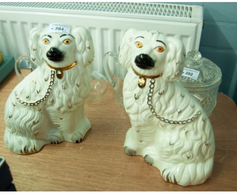 A PAIR OF TWENTIETH CENTURY BESWICK STAFFORDSHIRE STYLE POTTERY MANTEL SHELF DOGS 