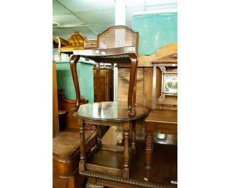 A CIRCULAR LOW OAK TABLE, WITH MOULDED EDGE, ON BALUSTER TURNED SUPPORTS JOINED BY STRETCHERS, ALSO A CARVED MAHOGANY FRAMED 