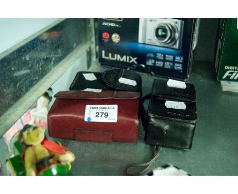 TWO CANON IXUS CAMERA AND A OLYMPUS XA2