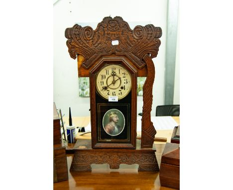 A LATE NINETEENTH CENTURY AMERICAN SHELF CLOCK, IN SCROLL CARVED CASE (A.F.) 