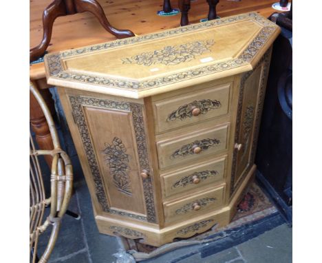 AN EASTERN STYLE CARVED LIGHT WOOD CABINET W83CM D36CM H83CM