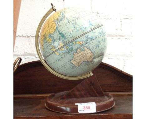 A CHAD VALLEY TIN PLATE TERRESTRIAL GLOBE ON STAND H27CM