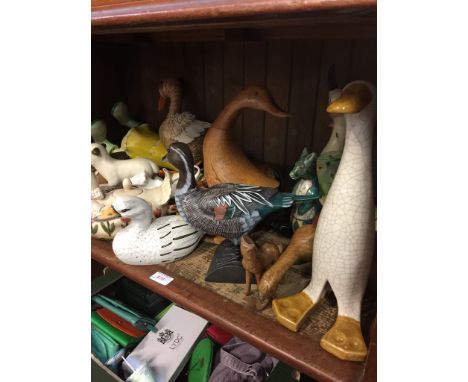 SHELF OF DUCKS AND OTHER ANIMAL FIGURES