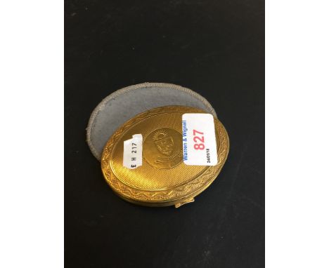 AN OVAL COMPACT     C