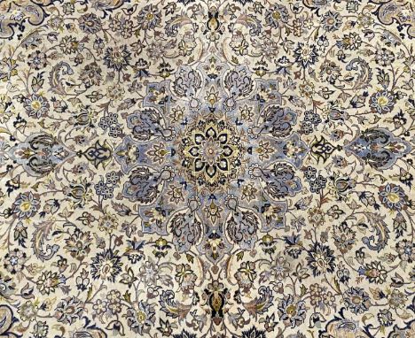 VINTAGE WOOLEN RUG with cream ground and floral pattern throughout, 385 x 275cmsProvenance: private collection Conwy