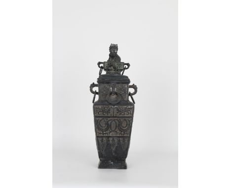 Chinese, Bronze Archaic Style Twin Handled Foo Lion Urn. With auspicious symbols, figures throughout exterior. Likely late Qi