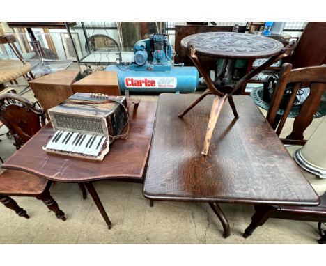 An oak tripod table together with an Edwardian mahogany Sutherland table, African carved folding occasional table and a Purat