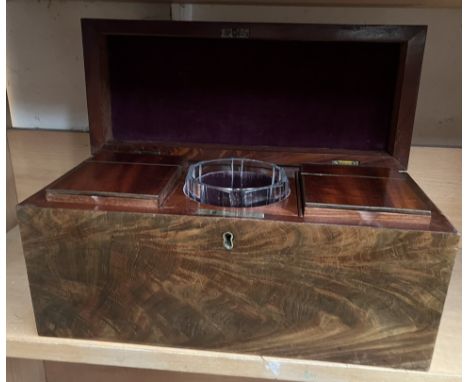 A 19th  century Tea caddy of rectangular form fitted with two compartments and a central glass bowl