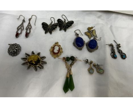 A pair of jade drop earrings together with other pairs of earrings, pendant etc 