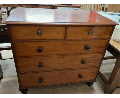 A 19th century mahogany chest with a rectangular top above two short and three long drawers on bracket feet