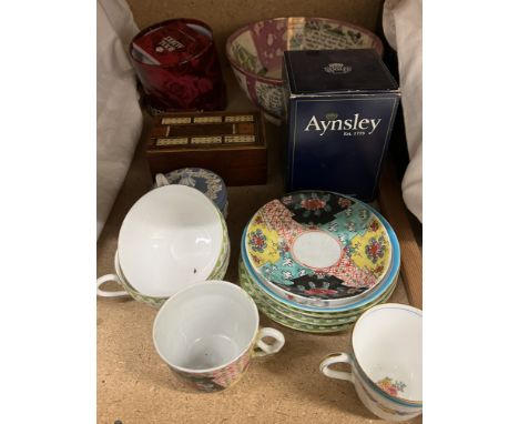A 19th century purple lustre ship decorated bowl together with a cribbage board, tea cups, Aynsley etc