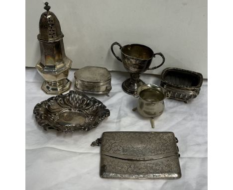 A silver baluster sugar sifter together with a silver trinket box, a silver purse, and other silver items