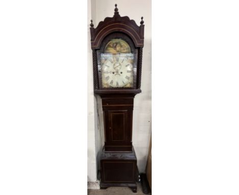 A 19th century mahogany longcase clock with a domed hood and rope twist columns above a short trunk door, box base and bracke