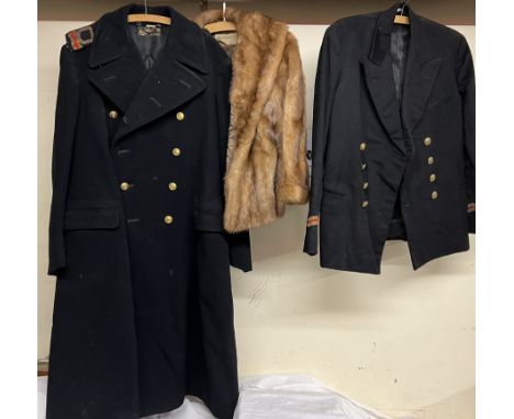 A Naval overcoat together with a naval uniform and a fur coat