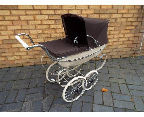 A vintage Silver Cross pram in good condition.