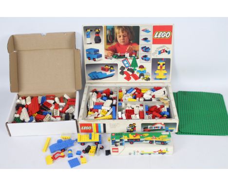 Lego - 2 x vintage boxed sets # 30 House and vehicles and # 692 Lorry and trailer. Both boxes are full of pieces and there ar