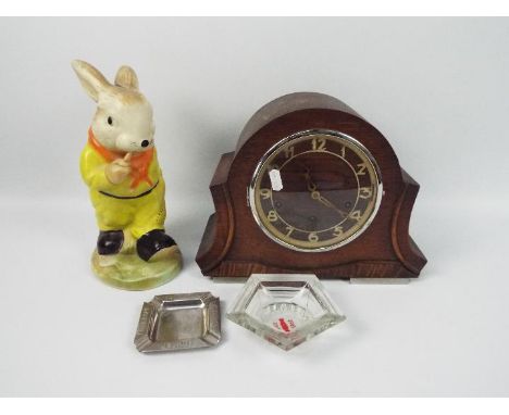 Lot to include an oak cased mantel clock, Ellgreave Pottery rabbit money bank and two ashtrays.