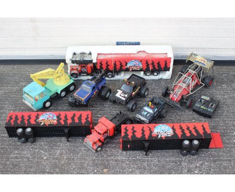 Echo - Playskool - Wamco - A collection of vintage trucks including a Playskool Bigfoot Ford monster truck, a Wamco Toyota Hi