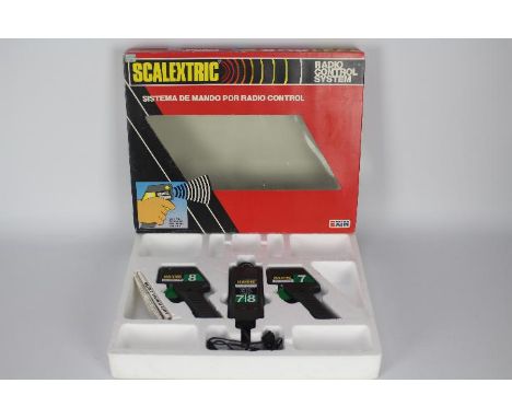 Scalextric - Exin - A boxed Radio Control System with two controllers # 8254. The items appear in Very Good condition in a Ve