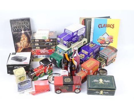 A quantity of vintage confectionary tins, Star Wars videos and soundtrack anthology, DVDs and similar.