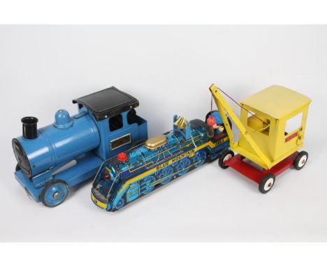 Tri-ang - Sutcliffe - Modern Toys -  A vintage Tri-ang Express pull along locomotive. It appears in Good overall condition bu