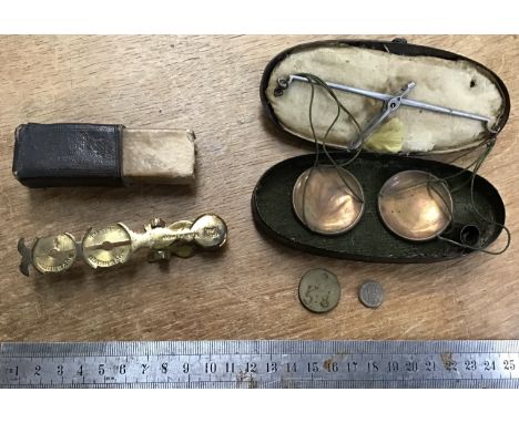 Sovereign coin scale with half of the Original Box and Apothecary scale In Original Tin with two coin weights.