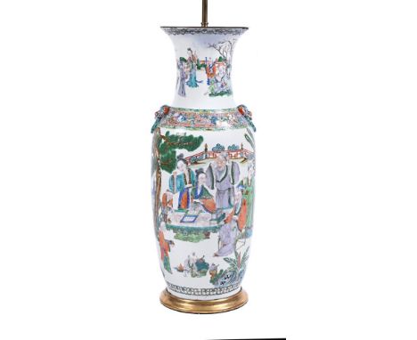 A large Chinese famille rose vase, circa 1860, painted to the exterior with scholars and ladies gathering in a landscaped gar