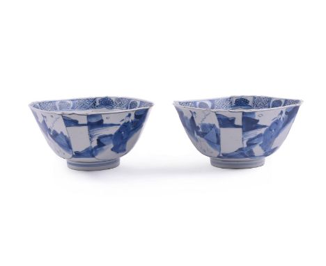 A pair of Chinese blue and white bowls, Kangxi, the four main sides are each decorated with figures in landscape scene within