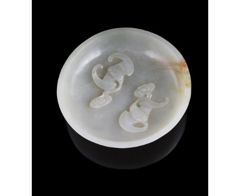 A Chinese celadon jade saucer, carved to the interior with a pair of bats, 8.6cm diameter青玉云蝠图小盘Condition Report: one small c