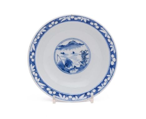 A Chinese blue and white blue and white bowl, Kangxi, the exterior painted with the three Daoist deities, the interior painte