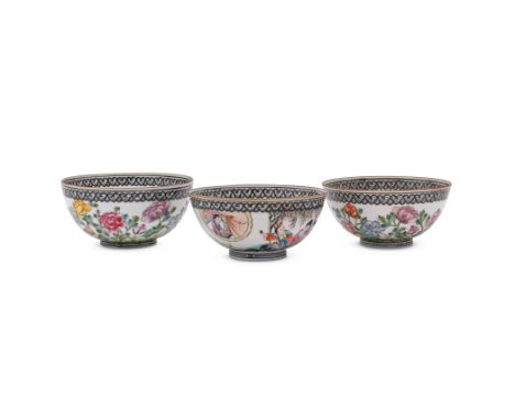 A group of three Chinese 'Egg shell' porcelain bowls, 20th century, two bowls enamelled to the sides with peonies and poems, 