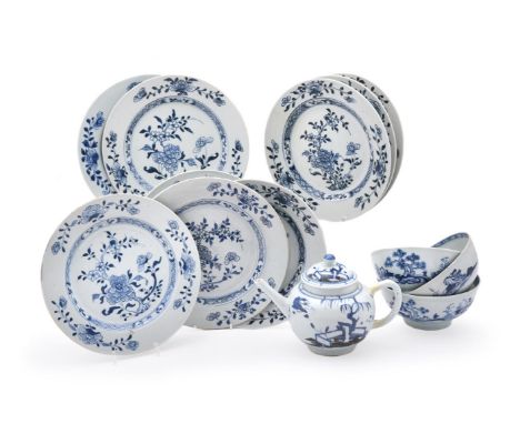 An assorted group of the Chinese 'Nanking cargo' porcelain, circa 1750, painted in blue and white, comprising: a tea pot and 