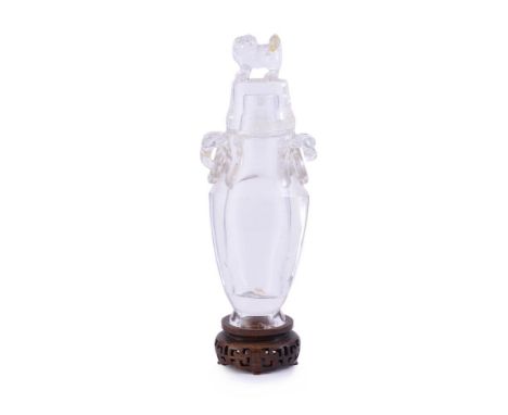 A large Chinese rock crystal vase and cover, Qing dynasty, with a tapering body and a waisted shoulder with two lingzhi fungu