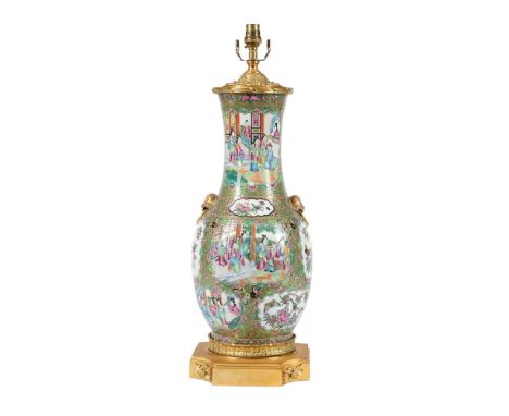 A Chinese canton export twin handled vase, 19th century, painted to the exterior with figures and birds in cartouches, fitted
