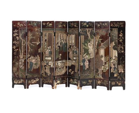 A Chinese eight-panel coromandel lacquer screen, Qing Dynasty, late 18th or early 19th century, decorated with a pavilion and